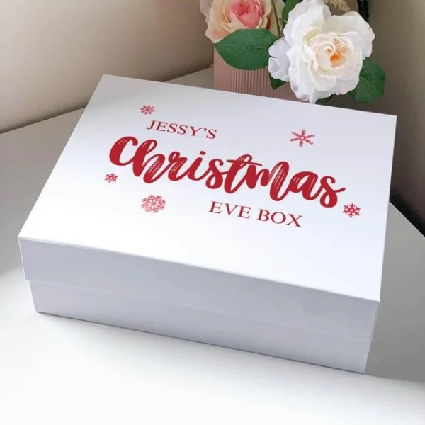 Personalized Christmas Eve boxes with festive decorations